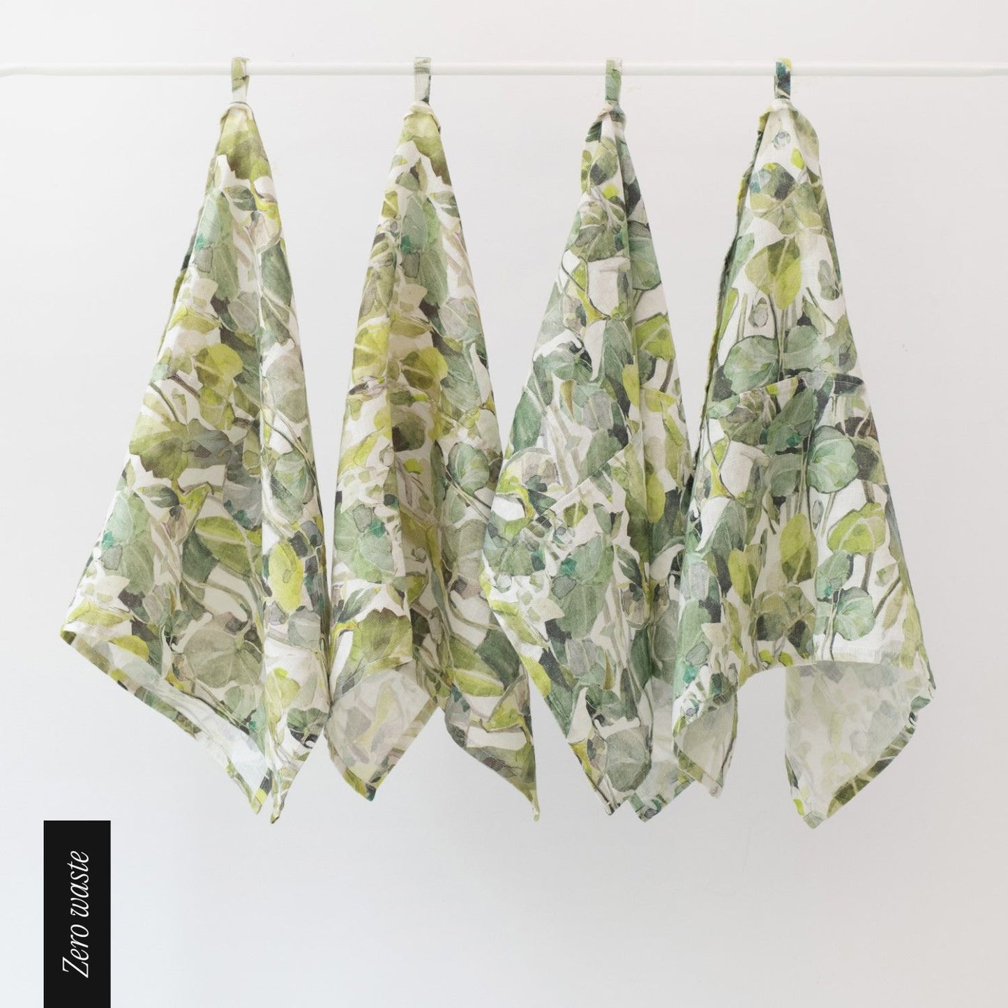 Kökshanddukar med grönt mönster.