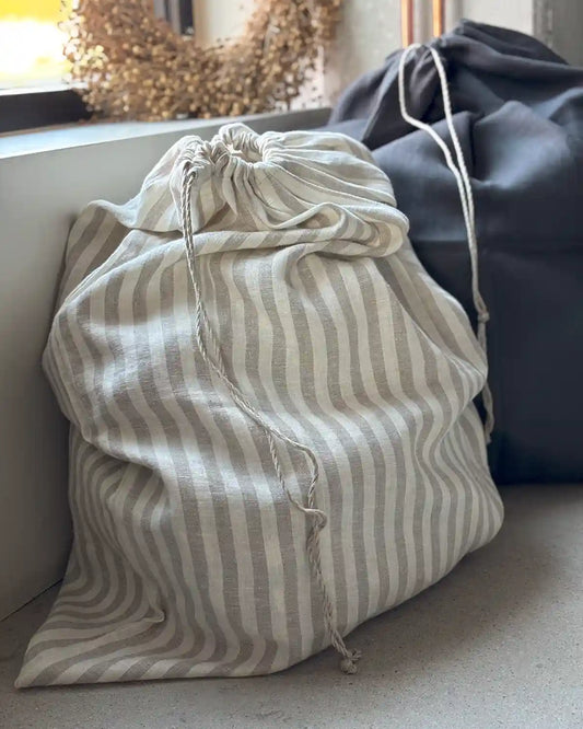 Stora linnepåsar med ränder och enfärgat.