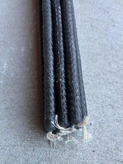 Svarta tvinnande ljus